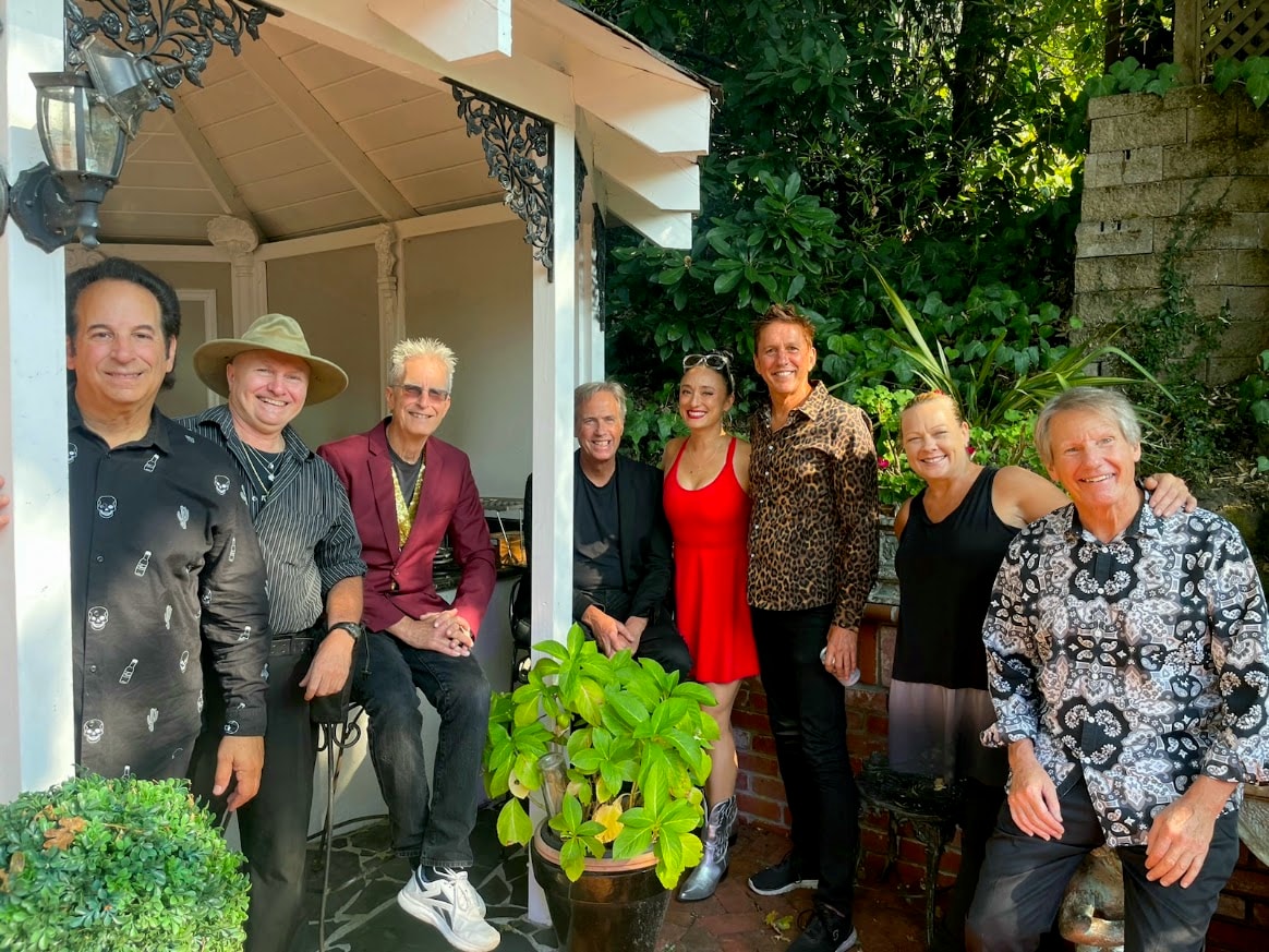 Neighbors sharing a warm moment together — the everyday connection at the heart of Porchaven™